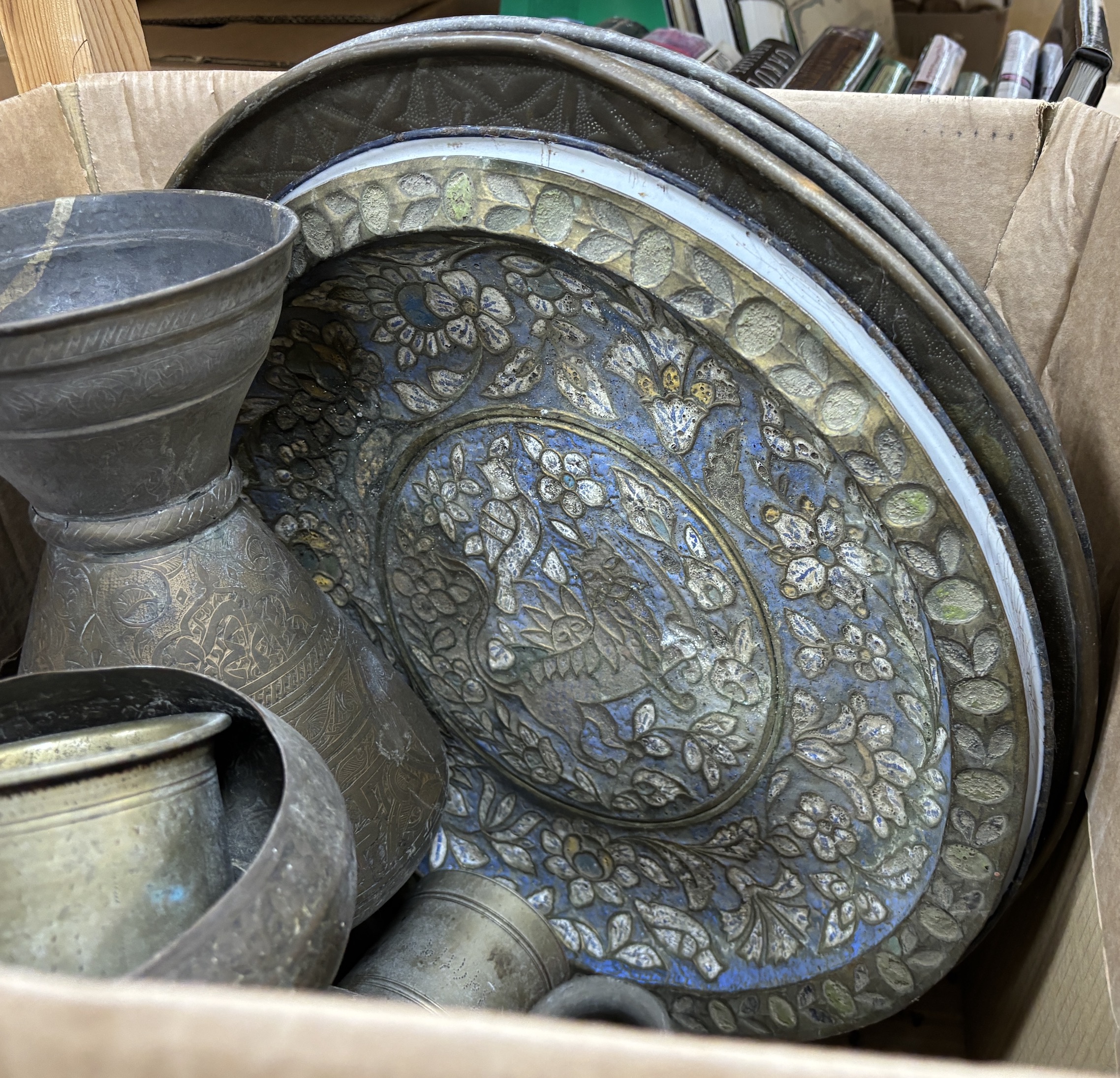 A collection of Indian metalware, including pots and measures, five trays, two vases, etc. tallest 40cm